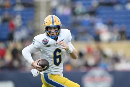 Pitt QB Mason Heintschel's season is over after tearing the ACL in his right knee